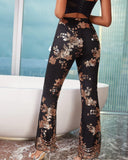 Sequins embroidered slim slits flared pants.